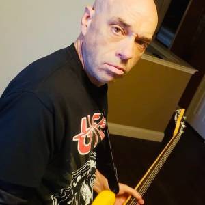 80s rock/metal influenced bassist
